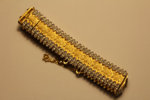 Articulated Gold Tone Rhinestone Bracelet
